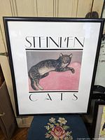 Full view of the framed Steinlen Cats poster showing the cat illustration, text, and frame.