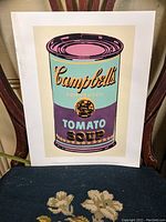 Front view of unframed print showing full image of Campbell's Tomato Soup can in pastel colors on pale background