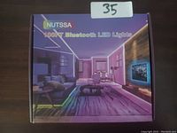 Box of NUTSSA 100FT Bluetooth LED Lights showing packaging and branding.