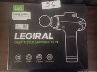 Box of Legiral deep tissue massage gun showing product image and features