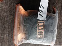 Slonik branded black zippered carrying case in shrink wrap with auction tag 197