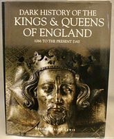 Front cover of hardcover book 'Dark History of the Kings & Queens of England' featuring bronze relief image of a crowned figure.