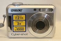 Front view of the Sony Cybershot DSC-S650 camera with labels for 7.2 megapixels, 3X optical zoom, and ISO 1000 sensitivity visible.