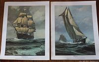 Two sailing ship prints side by side; left HMS Victory, right Bluenose, on white background