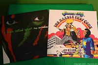 Front covers of the two vinyl albums, A Tribe Called Quest "The Anthology" and Jimmy Cliff "The Harder They Fall Soundtrack."