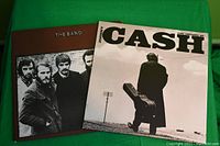 Front covers of The Band - Greatest and Johnny Cash - The Legend Of vinyl albums