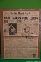 Full front page of the newspaper showing headline 'NIGHT RAIDERS BOMB LONDON' and multiple smaller articles and photos.