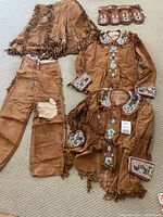 Overview of all six pieces laid flat on carpet