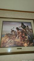 Photo of the full framed Native American print showing the scene and the frame
