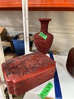 Shelf view showing both vase and box with lid