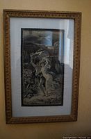 Full view of framed woven silk textile picture showing two children running from a storm under a dark sky.