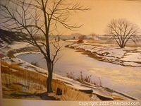 Close view of the watercolour painting showing the river, snow-covered banks, and barren trees in a winter landscape scene.