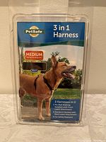 Photo of PetSafe 3 in 1 Harness in packaging showing medium size and black color