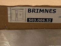 Close-up of the box label with Ikea Bremnes model and sketch of cabinet