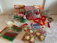 Overview of all baking accessories including measuring cups, cookie cutters, decorating tools, holiday decorations and twist ties