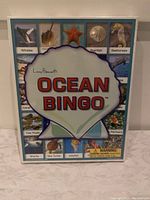 Front of Ocean Bingo game box showing title and ocean animal images.