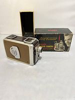 Vintage Kodak Brownie 8mm movie camera with original box and packaging.