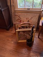 Framed artworks with magazine rack, showing sizes and framing details