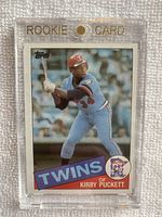 Front photo of 1985 Topps #536 Kirby Puckett rookie card in protective magnetic holder showing player in batting stance with light blue Minnesota Twins uniform.