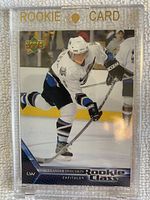 Front of the 2005-06 Upper Deck Rookie Class #2 Alexander Ovechkin hockey card in magnetic case showing player in white Washington Capitals jersey skating.