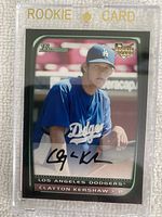 Front side of the 2008 Bowman Chrome Draft Clayton Kershaw rookie card in magnetic holder showing image of Kershaw in Dodgers uniform with autograph and 'Rookie Card' header.