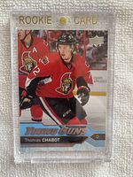 Front of Thomas Chabot 2016-17 Upper Deck Young Guns Rookie Card in plastic magnetic holder.