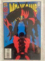 Front cover of Wolverine #88 comic book showing cover art of Wolverine and Deadpool, showing excellent color and condition.