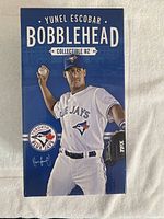 Front of the unopened Yunel Escobar bobblehead box showing the player in Blue Jays uniform and branding.