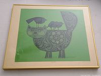 Full view of framed green cat and bird serigraph