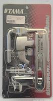 Packaged Tama FastClamp HW54 hi-hat stand attachment showing product and branding details