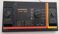 Top front view of the Magnavox Odyssey 3000 console showing controls, brand, and game mode selector.