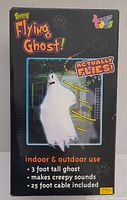 Box front showing the ghost flying with indoor and outdoor use, highlights 3 foot tall ghost, creepy sounds, and 25 foot cable included.