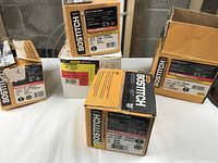 Five boxes of Bostitch framing gun nails with varying sizes and quantities.