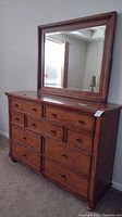 Front view of dresser with attached mirror