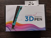 Box of Ataraxia Art 3D printing pen with colorful wave graphics and product image