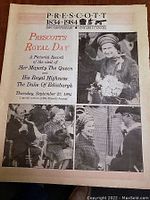 Photo of 1984 commemorative paper from Prescott Royal Day showing black and white images of Her Majesty the Queen and The Duke of Edinburgh with date and text.