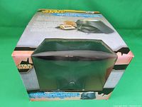 Darth Vader helmet-shaped toaster box front and top showing product and packaging
