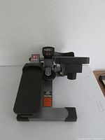 Full view of the Stamina electronic stepper, showing pedals and digital monitor.