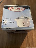 Box of Premium rice cooker 0.8L showing the brand and model PRC0835