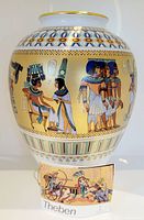 Porcelain vase front view showing Egyptian pharaoh scenes and Theben tag