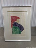 Overall view of the framed artwork showing full image and frame with matting.