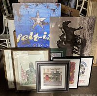 View of all art pieces grouped together, text star art, horses, knight, floral and vintage label art included