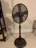 Photo front view of the Metal Hunter standup metal fan showing full height from base to fan head.