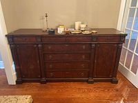 Full front view of the closed sideboard showing overall design and condition