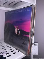 Photo of Stevie Wonder 'In Square Circle' LP record cover showing artwork and title.