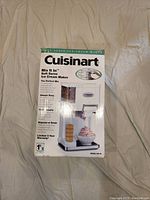 Photo of the original retail box for the Cuisinart soft serve ice cream maker model ICE-45 showing product image and features.