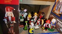 Photo showing all nutcrackers grouped together with original box visible
