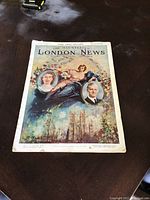 Front cover of the 1947 Illustrated London News Royal Wedding issue, showing detailed color artwork with portraits and Westminster Abbey.
