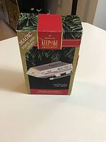 Photo of unopened Hallmark Keepsake Ornament box featuring Star Trek Shuttlecraft Galileo with voice and light feature.