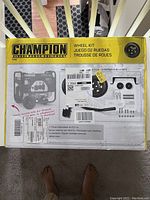Box front showing Champion branding, product name, and parts image